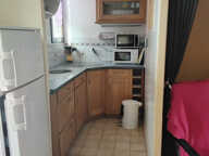 T1 AVEC COIN CHAMBRE EN RDJ THERMES A PIED — photo 3