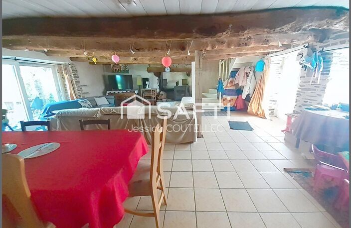 À seulement 10 minutes du centre de Ploërmel, découvrez cette longère pleine de charme dans un cadre privilégié ! — photo 2