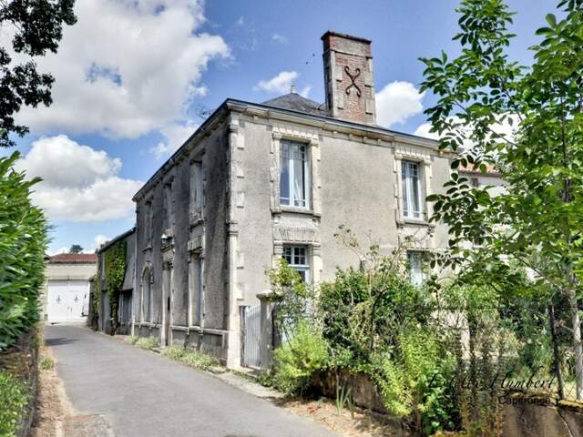Maison et atelier/garage de 131+35m² à Vouvant — photo du bien