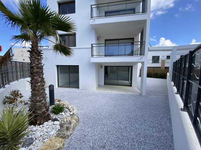 Appartements 3 Pièces La Palmyre de 86,03 m² avec Jardin et place de parking — photo du bien