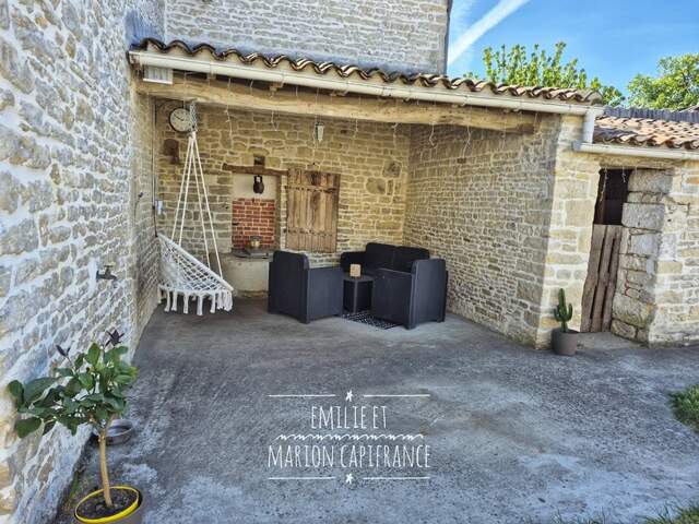 Maison à vendre 4 chambres - Mauzé - Jardin - double garage - locataires en place — photo du bien