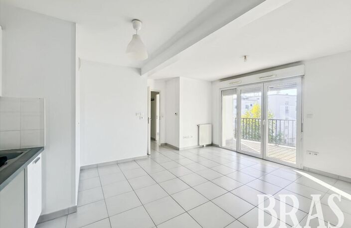 RUE DE LA RIVETERIE - T3 avec balcon et parking — photo 4