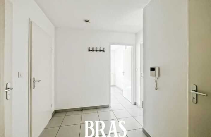 RUE DE LA RIVETERIE - T3 avec balcon et parking — photo 5