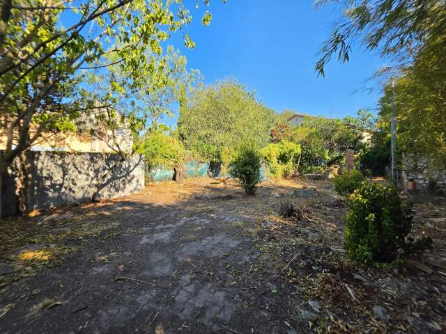 Petit immeuble à fort potentiel avec terrain constructible — photo du bien