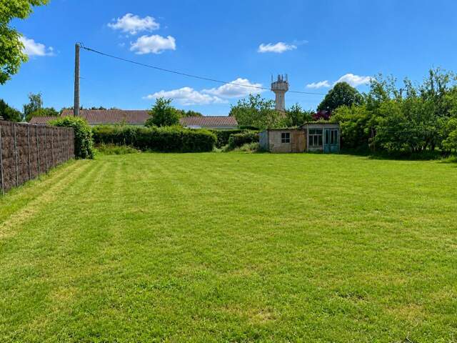 Terrain constructible plat de 1118 m2 à Vouneuil sous Biard — photo du bien