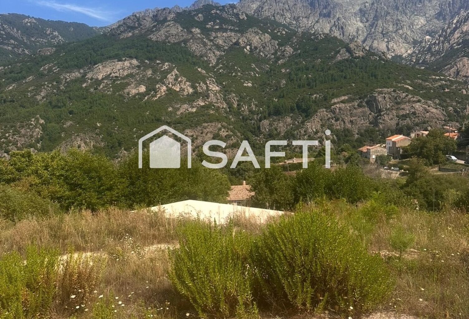 terrain  de 2 471 m2 à Bocognano comprenant deux dalles déjà construites, avec permis de construire accordés — photo 1