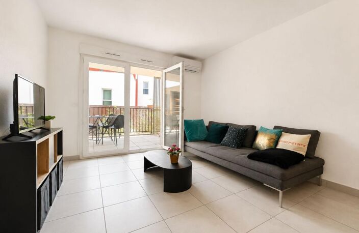 T3 AVEC TERRASSE, BOX & ASCENSEUR ! — photo 3