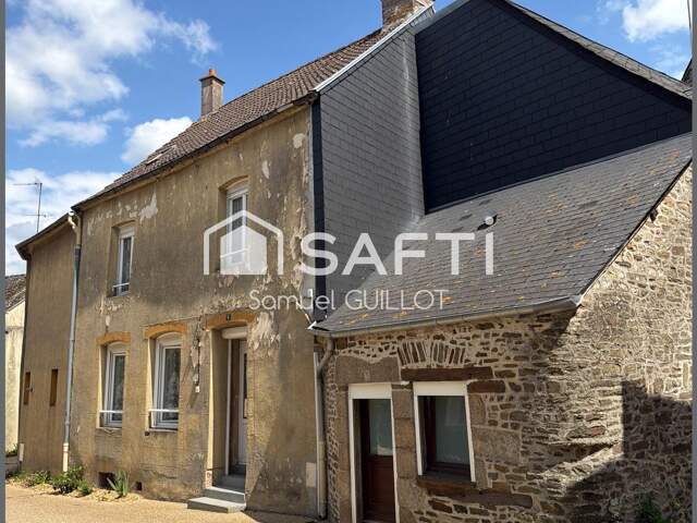 Maison de ville en pierre avec grand garage — photo du bien