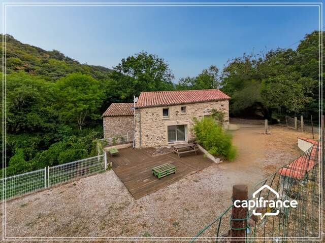 Ancien moulin en pierre rénové – Charme, confort et nature au cœur du Haut-Languedoc — photo du bien