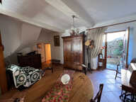 MAISON DE VILLAGE EN PIERRE AVEC GARAGE, 2 COURS ET GRENIER — photo 2