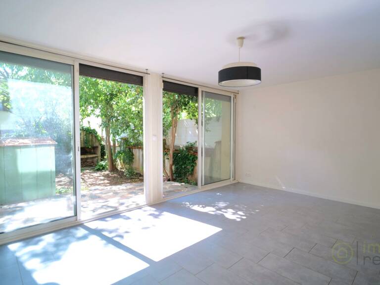 Appartement en rez-de-jardin — photo 1