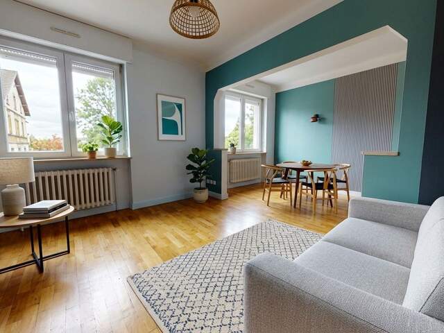 Spacieux F4 de 103m² avec 3 chambres – Charme de l'ancien, luminosité et proximité des commodités — photo du bien
