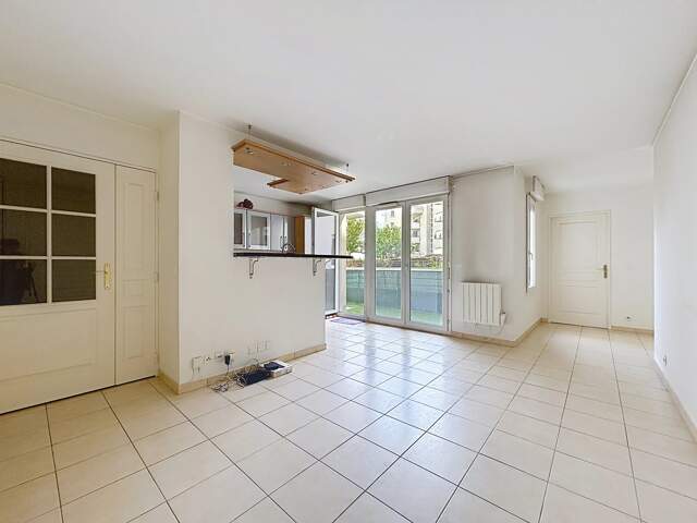 Appartement 3 pièces de 65m2 avec balcon et box — photo du bien