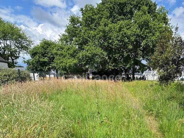 MESQUER - BEAU TERRAIN CONSTRUCTIBLE A VENDRE AU CALME - ACCÈS TOUT À PIED OU À VÉLO — photo du bien