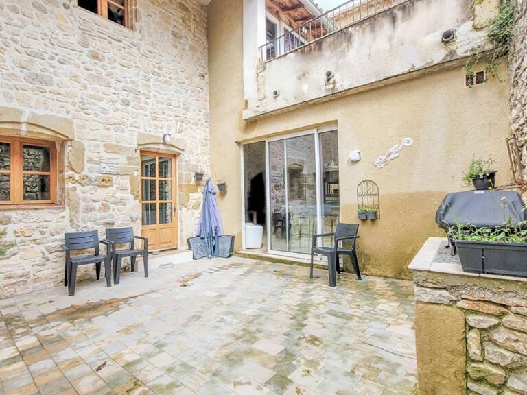 Maison en pierres rénovée avec cour et terrasses — photo 1