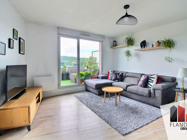 GRIGNY - Appartement T3 de 57 m2 en dernier étage avec terra — photo du bien