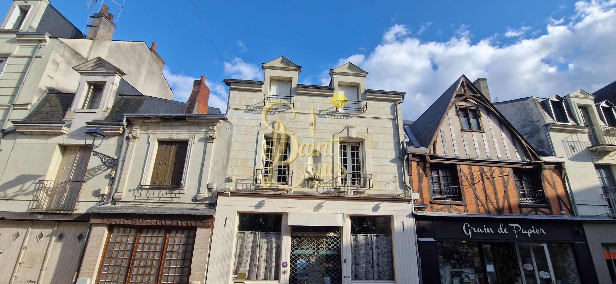 PETIT IMMEUBLE AVEC BOUTIQUE ET APPARTEMENT EN TRIPLEX