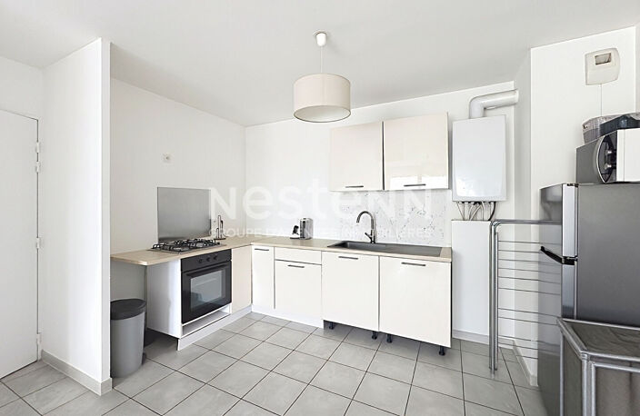 Appartement 3 pièces 2 chambres vendu loué avec terrasse et garage - 69500 BRON — photo 4