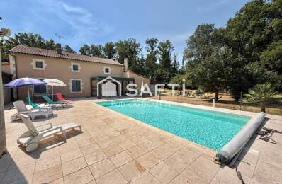 MAISON EN PIERRE 5 CHAMBRES + STUDIO ATTENANT ET PISCINE AVEC JARDIN A LEZAY — photo du bien