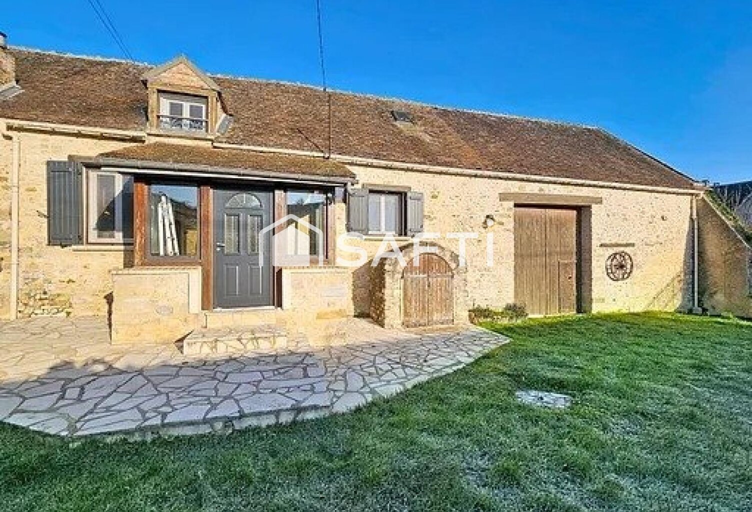 Une maison chaleureuse avec jardin clos et grange — photo 1