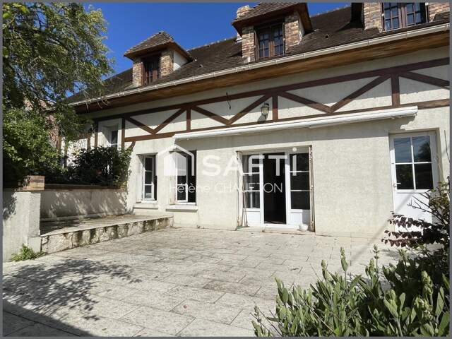 Ensemble de deux maisons totalisant 288 m² et 7 chambres sur un jardin clos de 1293m². — photo du bien