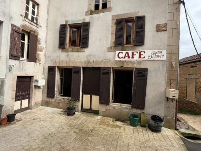 Maison À Vendre avec appartement loué — photo du bien