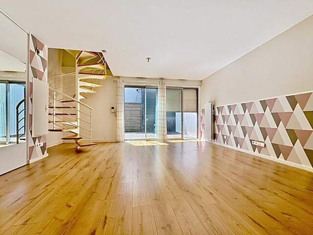 Appartement en Duplex de 70m2  , 2 chambres,,terrasse dans résidence sécurisée  avec places de parking — photo du bien