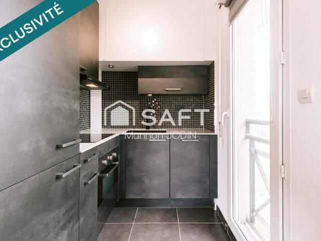 Appartement F2 avec balcon, cave et parking — photo du bien