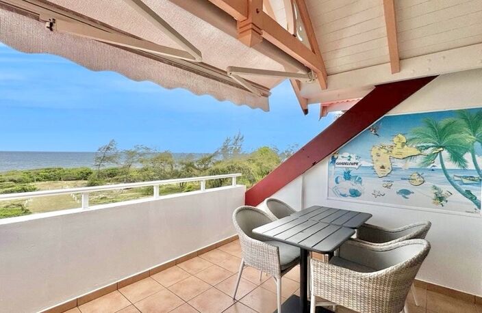 A VENDRE - VUE MER A COUPER LE SOUFFLE – MAGNIFIQUE T3 EN PREMIERE LIGNE - SAINTE ANNE — photo 4