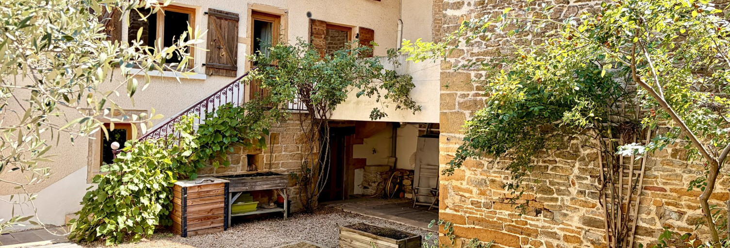 Maison 8 Pièces 220 m² à vendre à Porte des Pierres Dorées (69400)