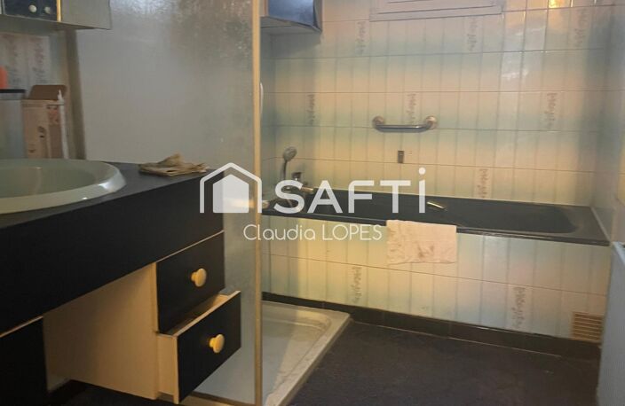 MAISON DIVISEE EN 4 APPARTEMENTS LOUES — photo 4