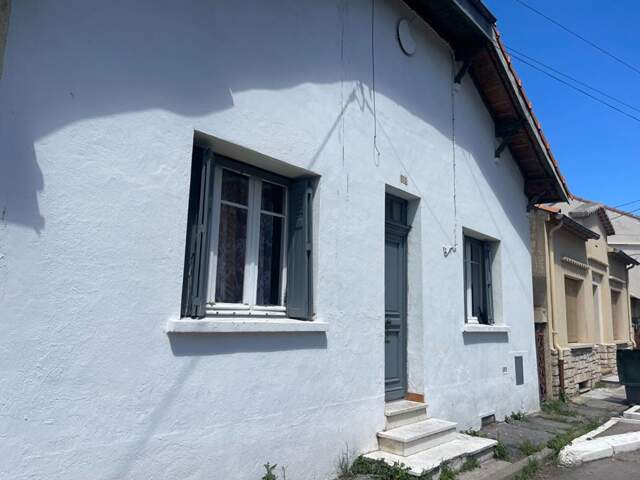A vendre maison mitoyenne  3 pièces de  65 m2 avec grand garage sur terrain de 295 m2 — photo du bien