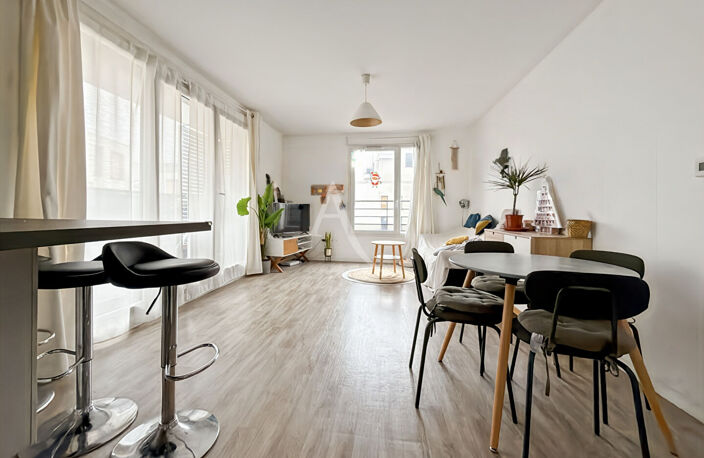 F3 au coeur de ville avec terrasse et 1 place de parking en sous sol — photo 4