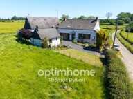 Maison avec grange et fort potentiel dans un environnement calme avec 3 000m² de terrain — photo 2