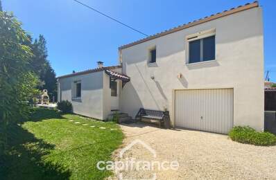 Maison familiale d'environ 100 m2 avec piscine, terrain arboré et grand garage au calme de la campagne ardéchoise — photo du bien