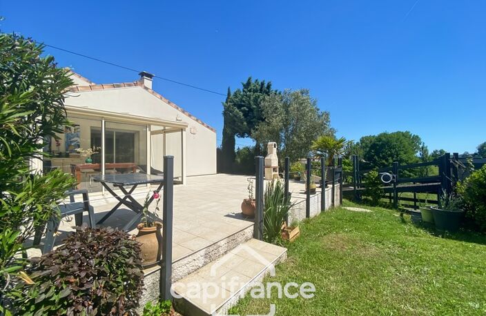 Maison familiale d'environ 100 m2 avec piscine, terrain arboré et grand garage au calme de la campagne ardéchoise — photo 4