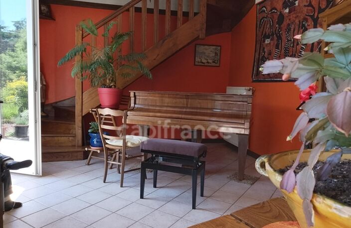 Maison avec écrin de verdure et bois — photo 4