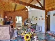 Maison à ossature bois avec vue panoramique, terrain de 1 077 m² et vaste carport — photo 2