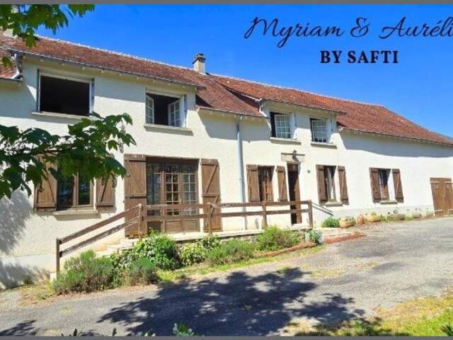Maison 9 pièces garage sur terrain de plus de 3 hectares — photo du bien