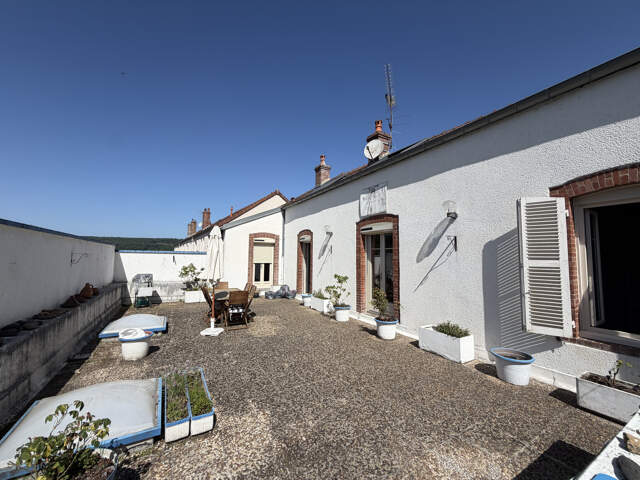 MAISON DE VILLE — photo du bien