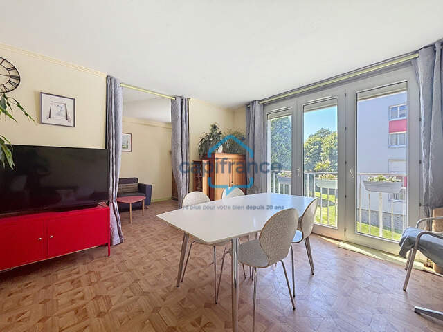 Appartement T4 lumineux avec cave, box/parking et grand stationnement extérieur — photo du bien