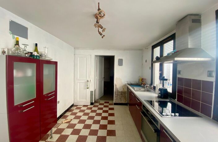 MAISON DE VILLAGE AVEC GRAND GARAGE ET DOUBLE ACCES — photo 2