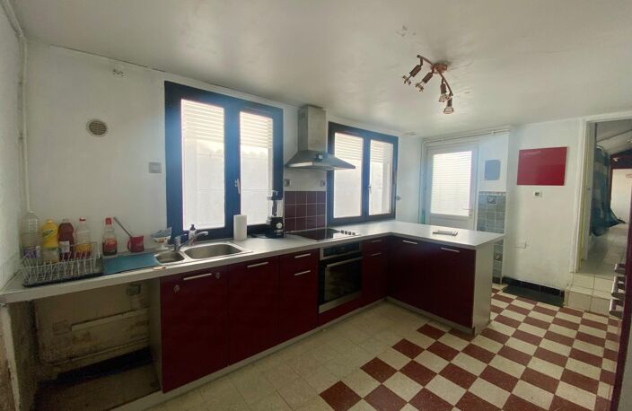 MAISON DE VILLAGE AVEC GRAND GARAGE ET DOUBLE ACCES — photo 3