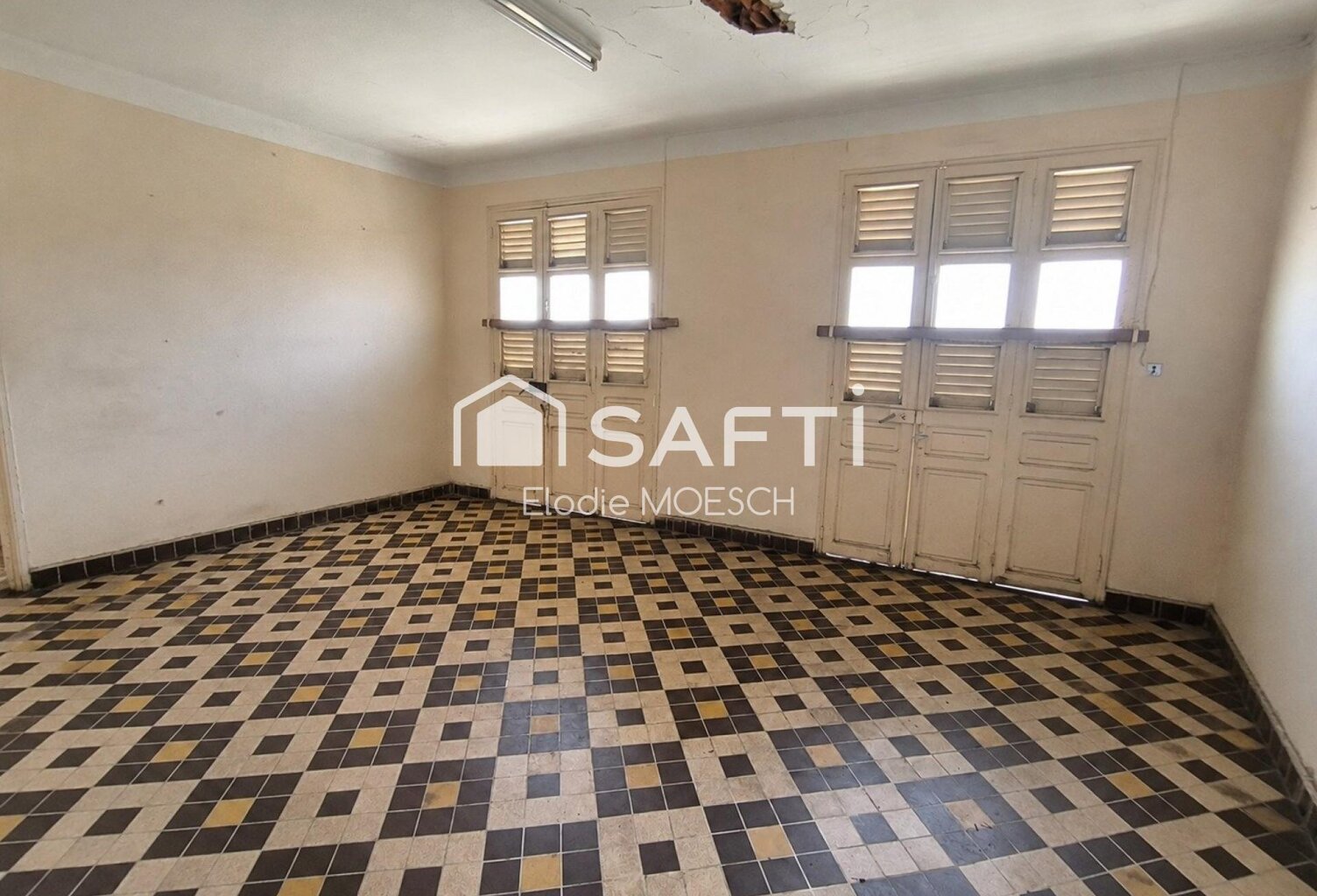 Maison dans le bourg du Saint Esprit — photo 1