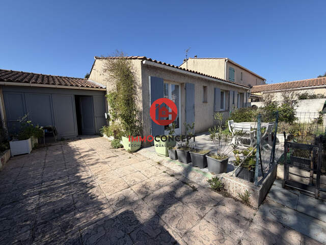 Maison de plain pied avec garage — photo du bien