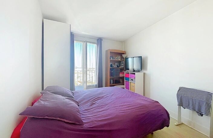 Appartement F3 traversant de 57m2 au dernier étage avec vue dégagée et rénovation énergétique votée — photo 4