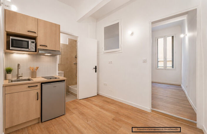 Immeuble en monopropriété composé d' un commerce et de 7 studios. — photo 4
