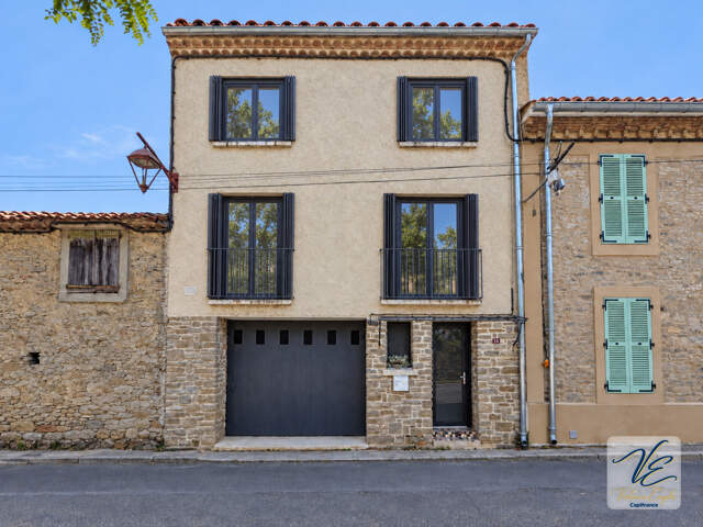 Maison rénovée à Siran – 3 chambres, terrasse, cour et grand garage de 60 m² — photo du bien