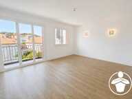 EN EXCLUSIVITÉ – T2 traversant de 55 m² avec balcons, entrée centrale et espace dressing – Proche du centre-ville d’Agen — photo 2