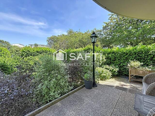 Rez de jardin de 101m2, terrasse, 2 parkings — photo du bien